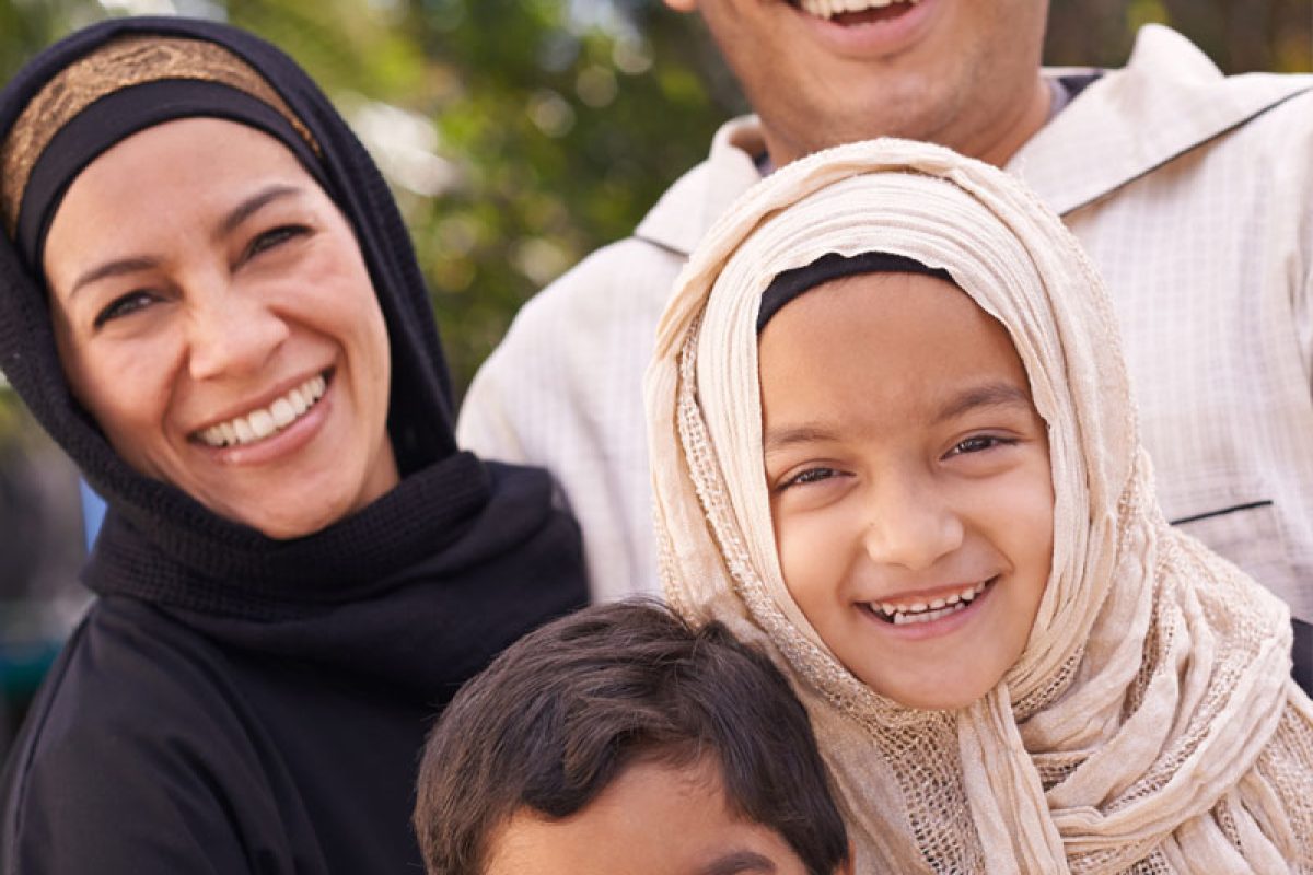all-smiles-muslim-family-enjoying-day-outside